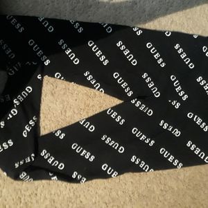 Guess leggings new, never worn,  logo guess imprint all over.  Black and white.